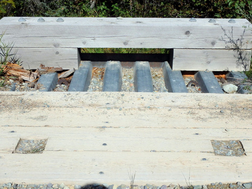 The square holes were for access to hooks for a crane lift operation.